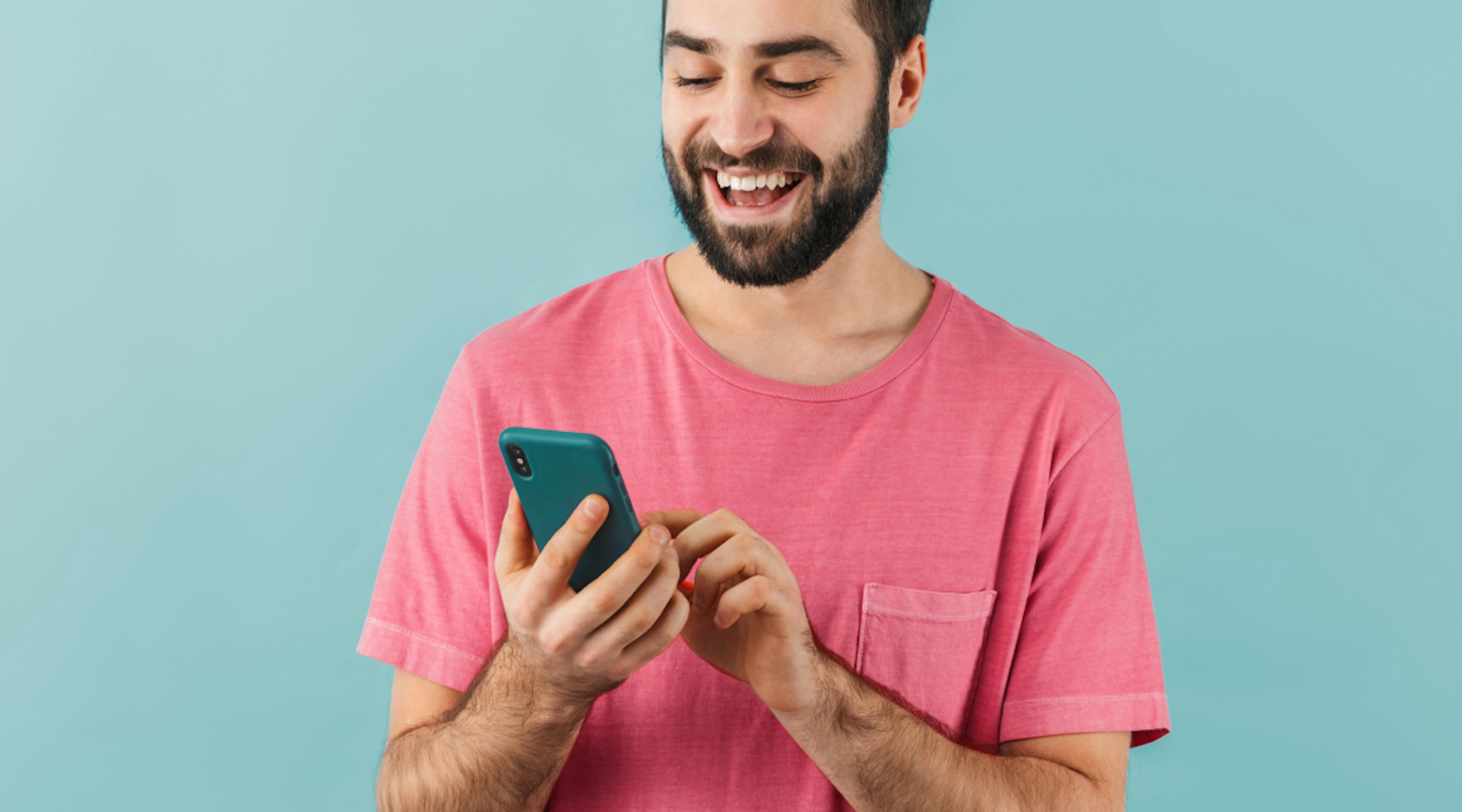 Man using phone and looking happy