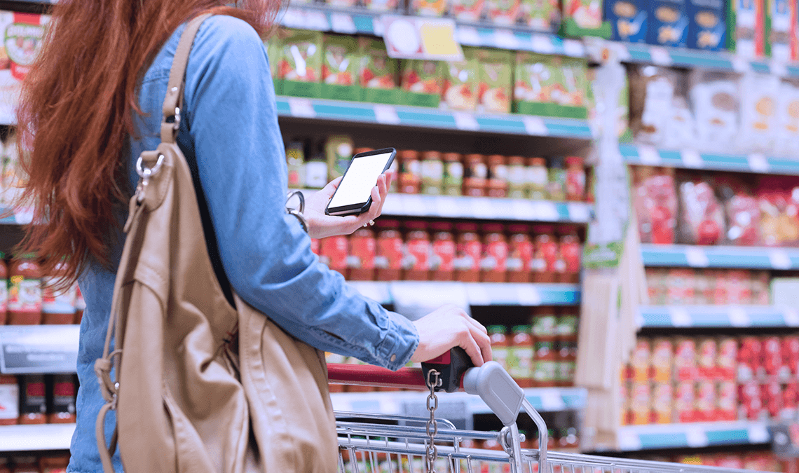 Woman Shopping and earning cash back with Ibotta