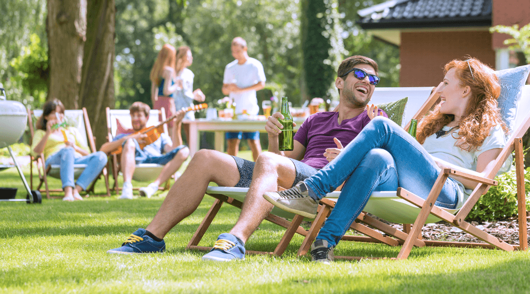 people enjoying backyard bbq